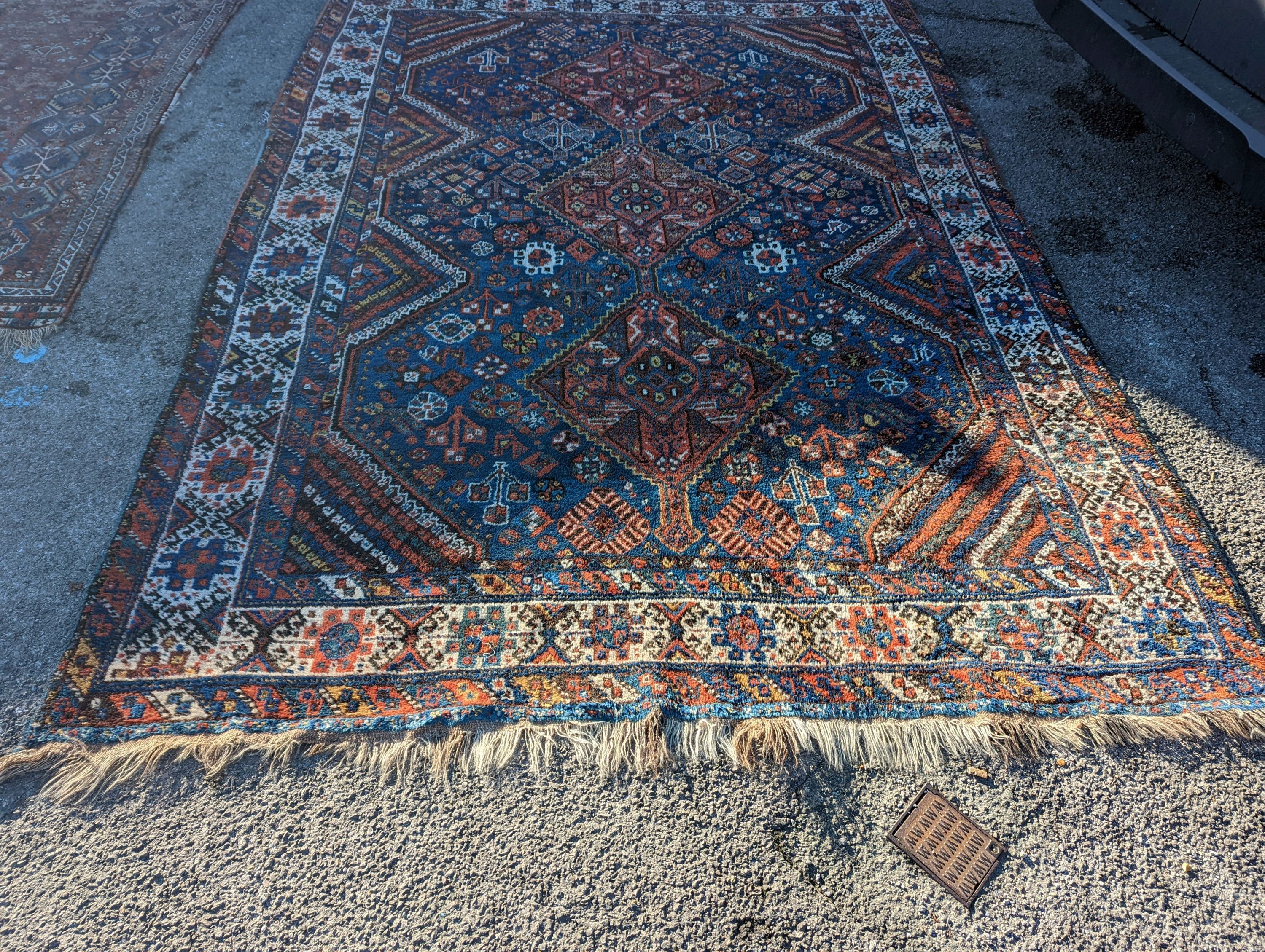 A Shirvan blue ground carpet, 315 x 222cm